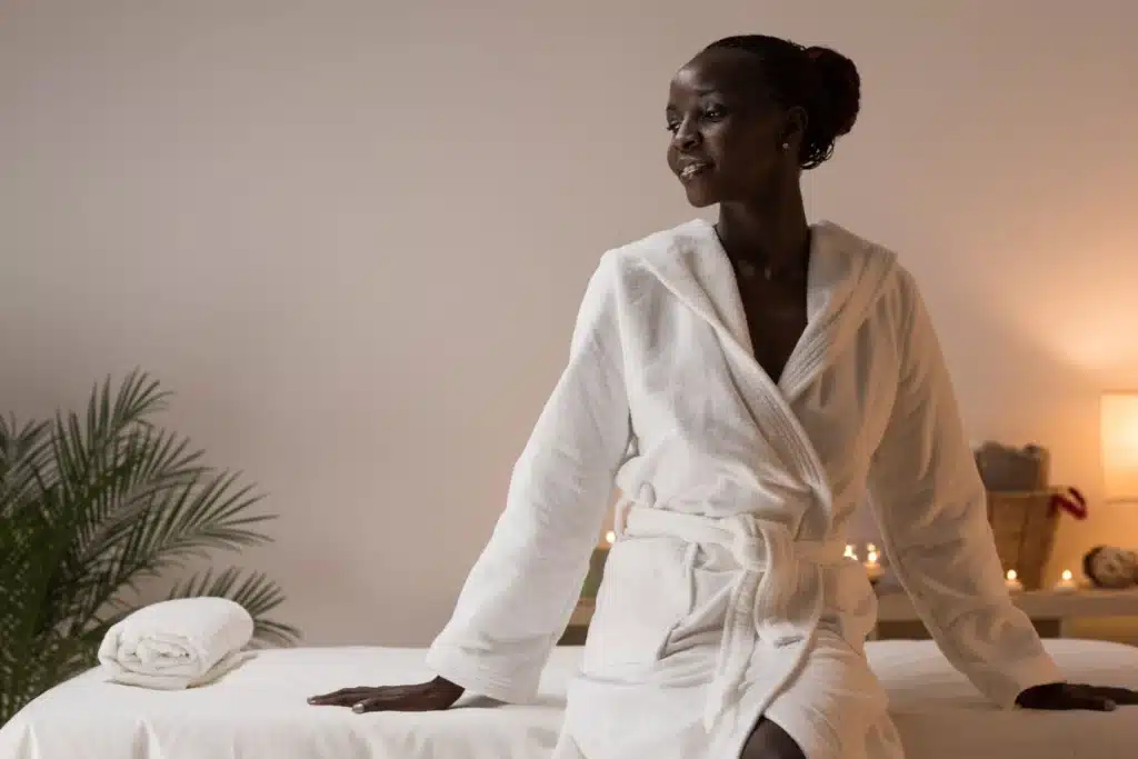 Woman relaxing in a robe at Magdalen’s Pure Skin Care, a top spa in Rockville, MD, for waxing, facials, and skincare services.